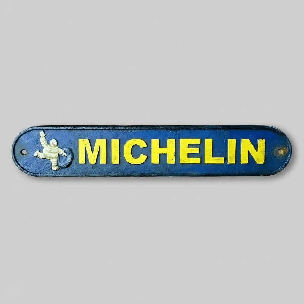 Michelin Man 1889 Cast Iron Plaque