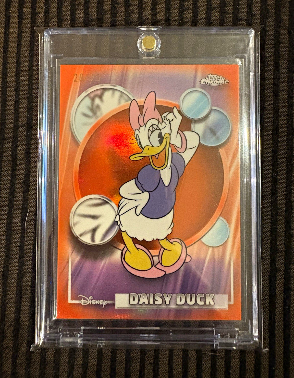 2026 Topps Chrome Disney Daisy Duck Orange Refractor /25 #54 2026 Topps Chrome Disney Daisy Duck Orange Refractor /25 #54