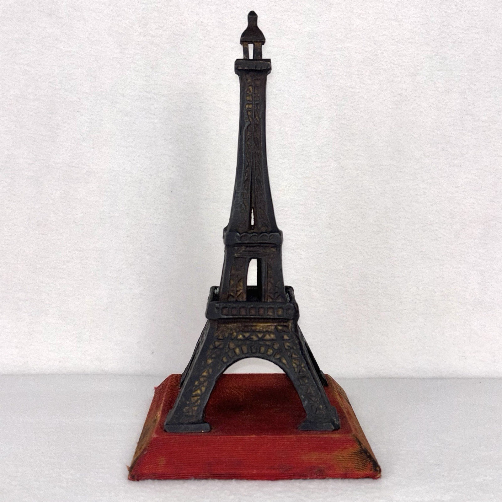 VTG Anthropologie Paris Eiffel Tower Cast Metal Sculpture Red Satin Base 9.5” VTG Anthropologie Paris Eiffel Tower Cast Metal Sculpture Red Satin Base 9.5”