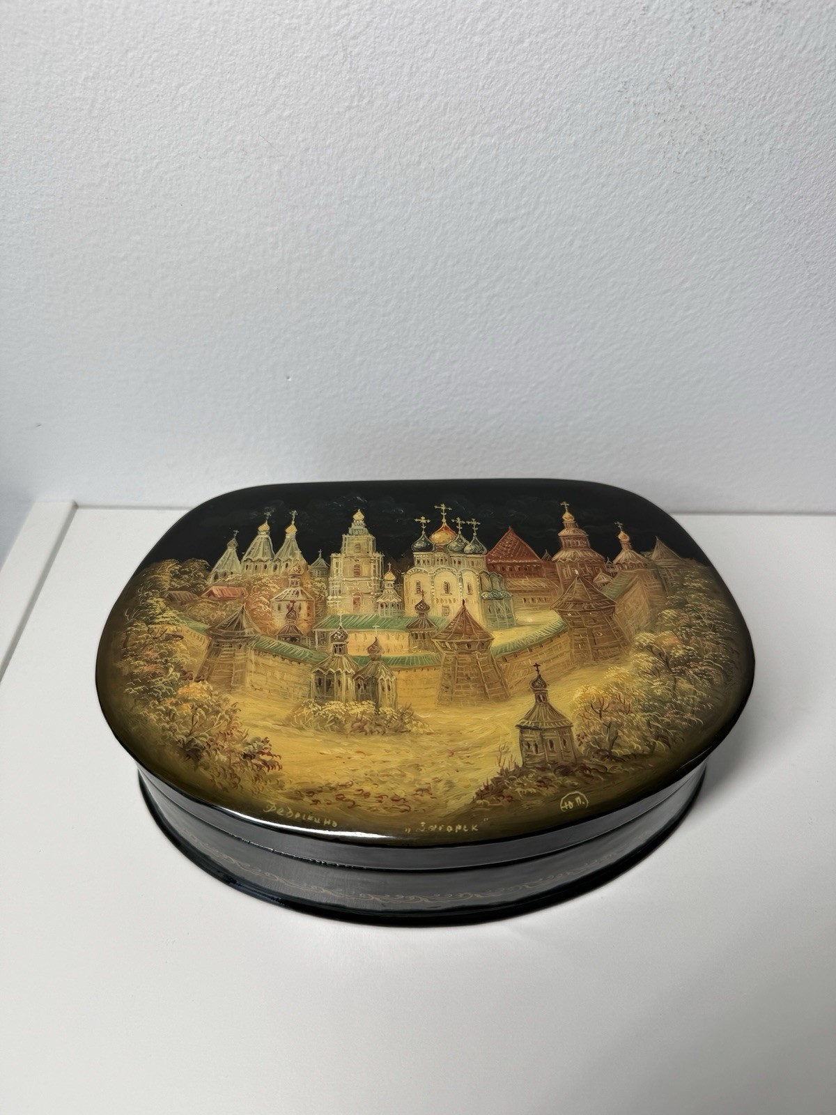 Fedoskino Russian Hand Painted representing a walled city Gold/Black Lacquer Box
