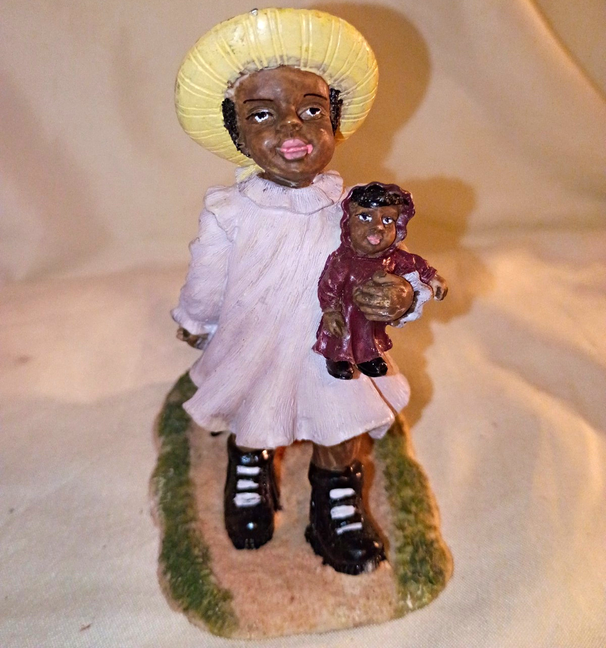 Painted Resin Hand Painted Woman Pulling Child in Wagon Holding Doll Figurine