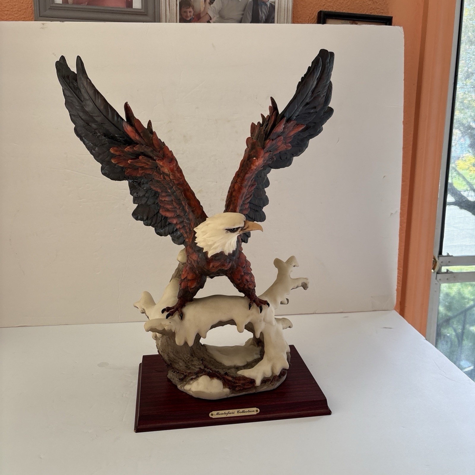 Montefiori Collection Italy Design: Open Winged Eagle Sculpture on Snowy Branch Montefiori Collection Italy Design: Open Winged Eagle Sculpture on Snowy Branch