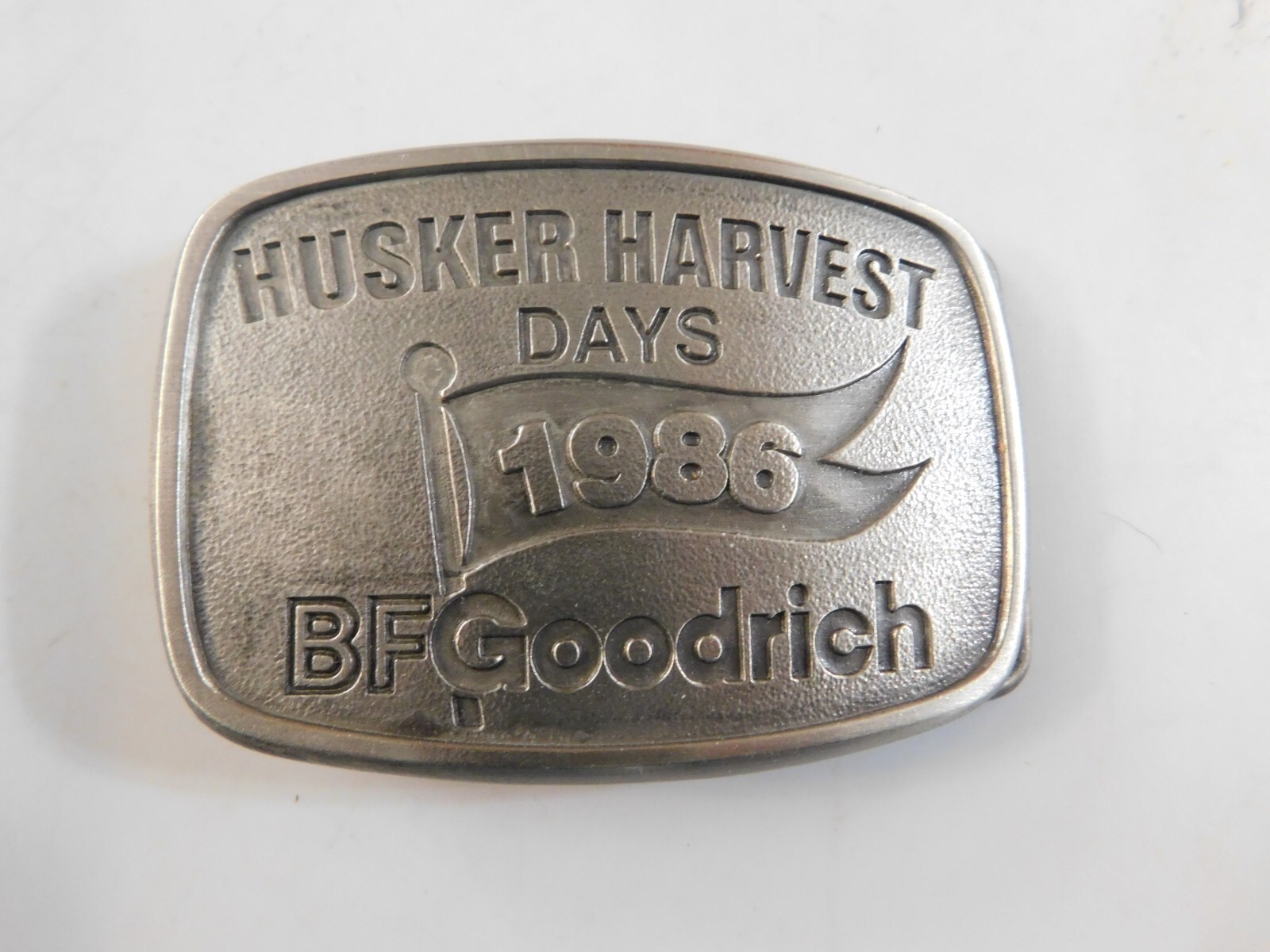 1986 BF GOODRICH NEBRASKA HUSKER HARVEST DAYS PEWTER BELT BUCKLE NEW SISKIYOU