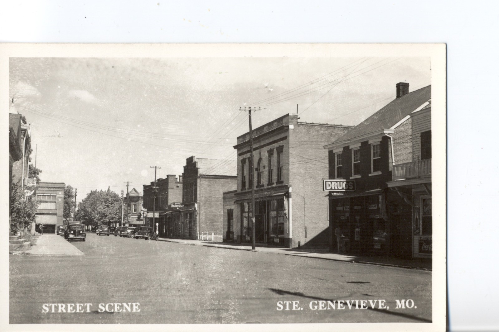 Street Scene, Ste. Genevieve, Mo. Missouri Real Photo Postcard. Drug Store Sign