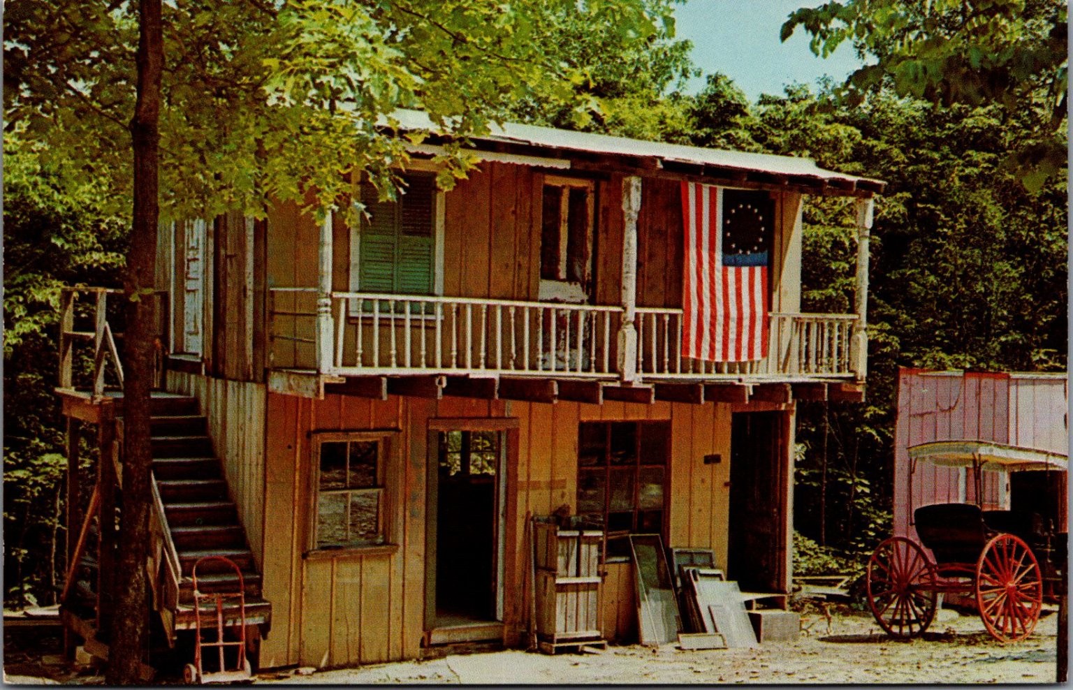 Ed's Ghost Town Hotel Bedford Indiana Vintage Postcard Dexter Chrome US Flag