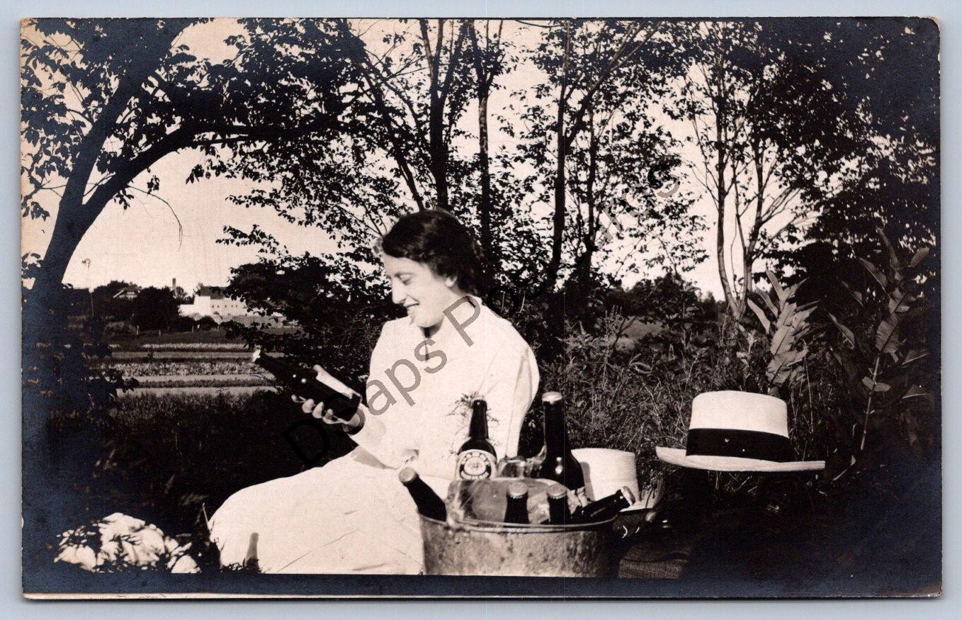 K58/ Interesting RPPC Postcard c1910 Beer Bottle Pabst? Woman on Ice 238