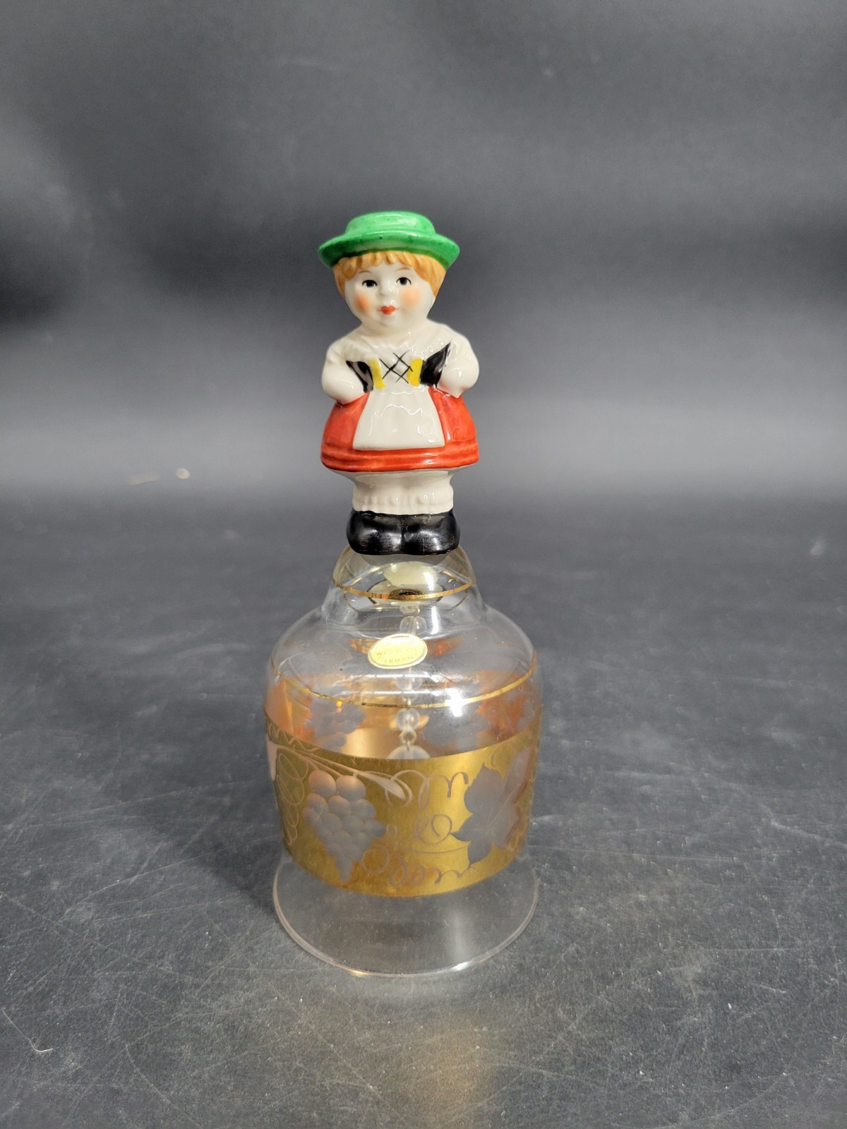 Vintage Goebel Porcelain Hand-Painted Green Hat Girl on Gold-Etched Glass Bell