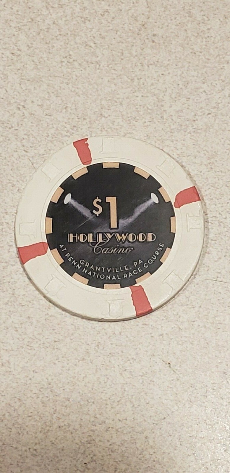 Hollywood Casino $1.00 White Chip - used and Circulated - Gantville, PA
