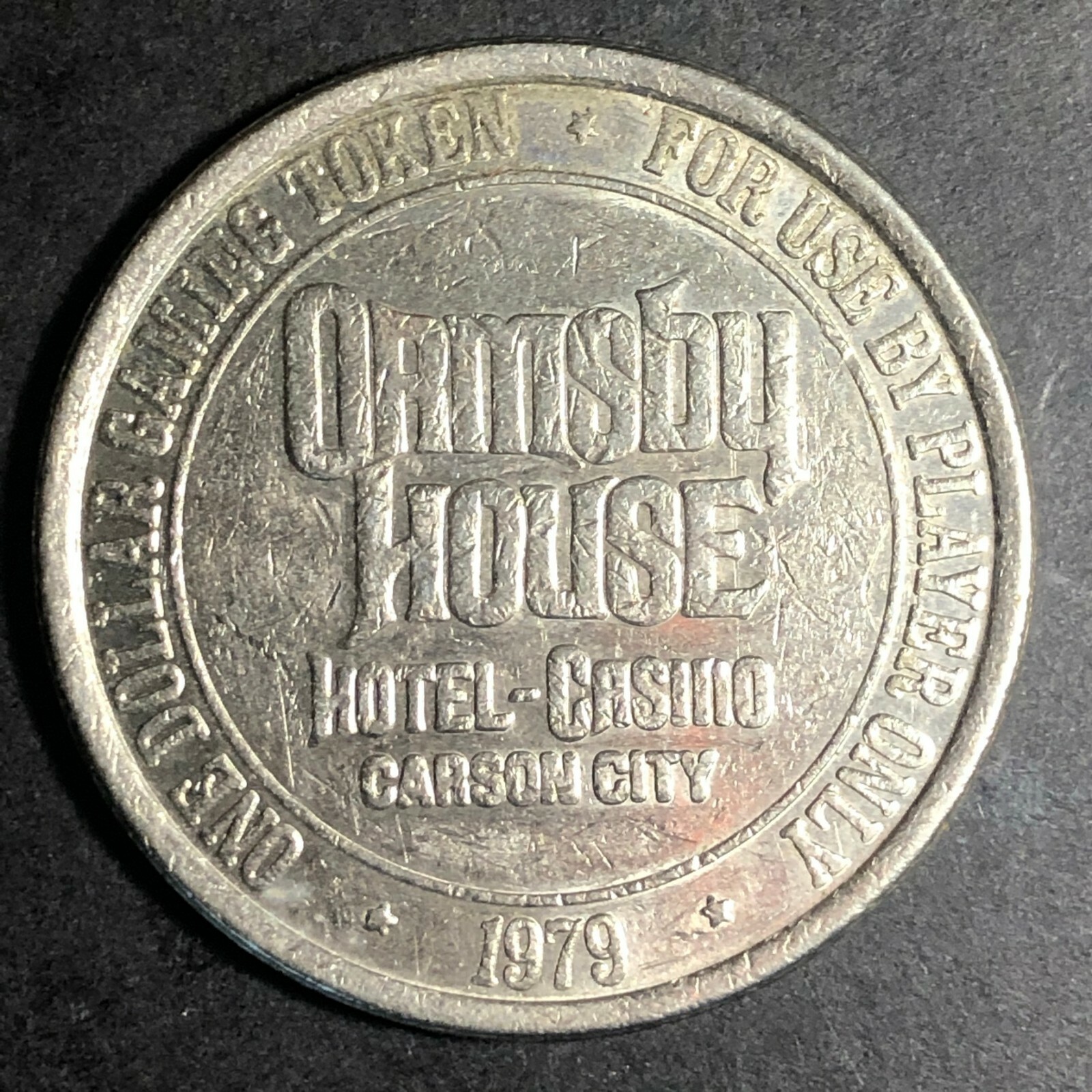1979 37mm Plated Brass $1 Ormsby House Carson City, NV Gaming / Slot Token