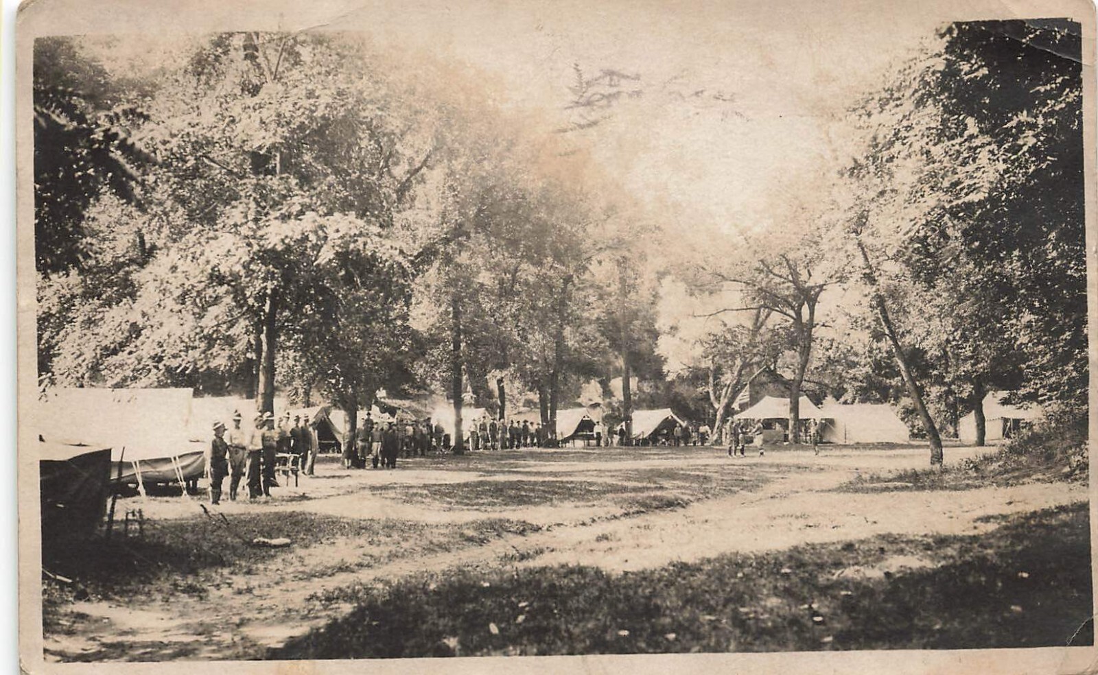 RPPC - Boone, Iowa, Military Encampment in The Woods - C. 1910