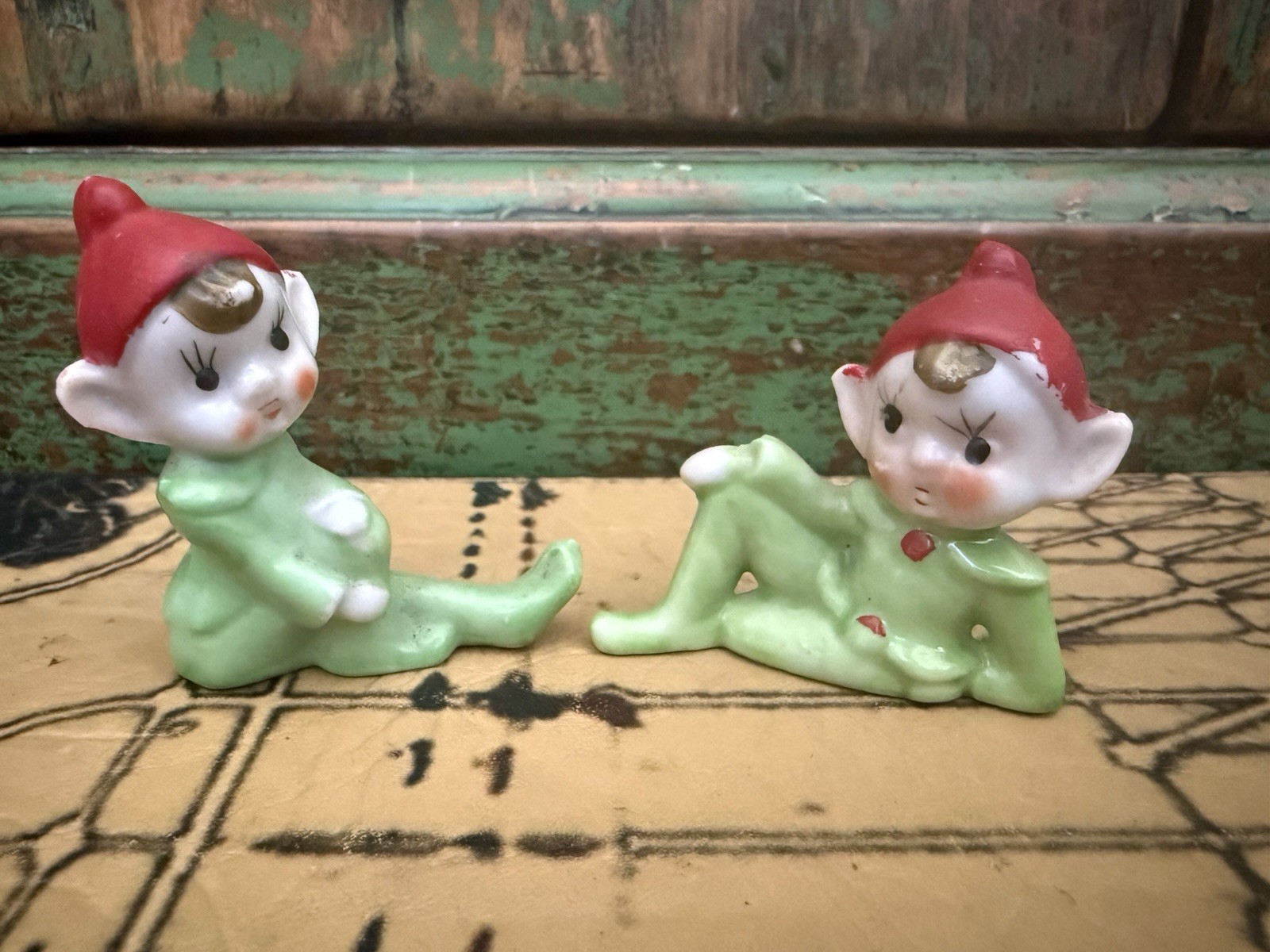 Vintage Porcelain 1950\'s Small Pixie Elf Sitting Red Hat Japan Set Of 2