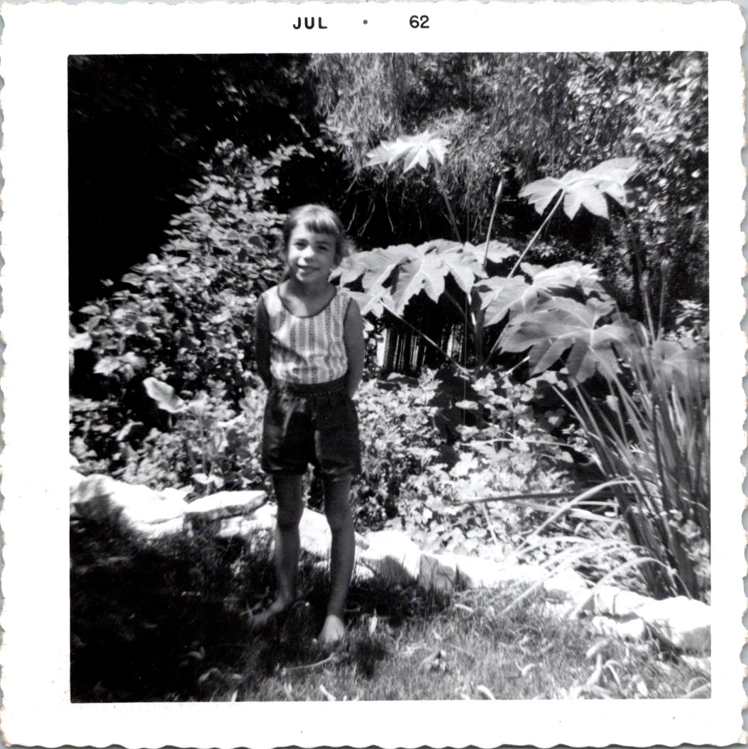 Smiling Young Girl in Summer Garden, 1962 B&W Snapshot Photo