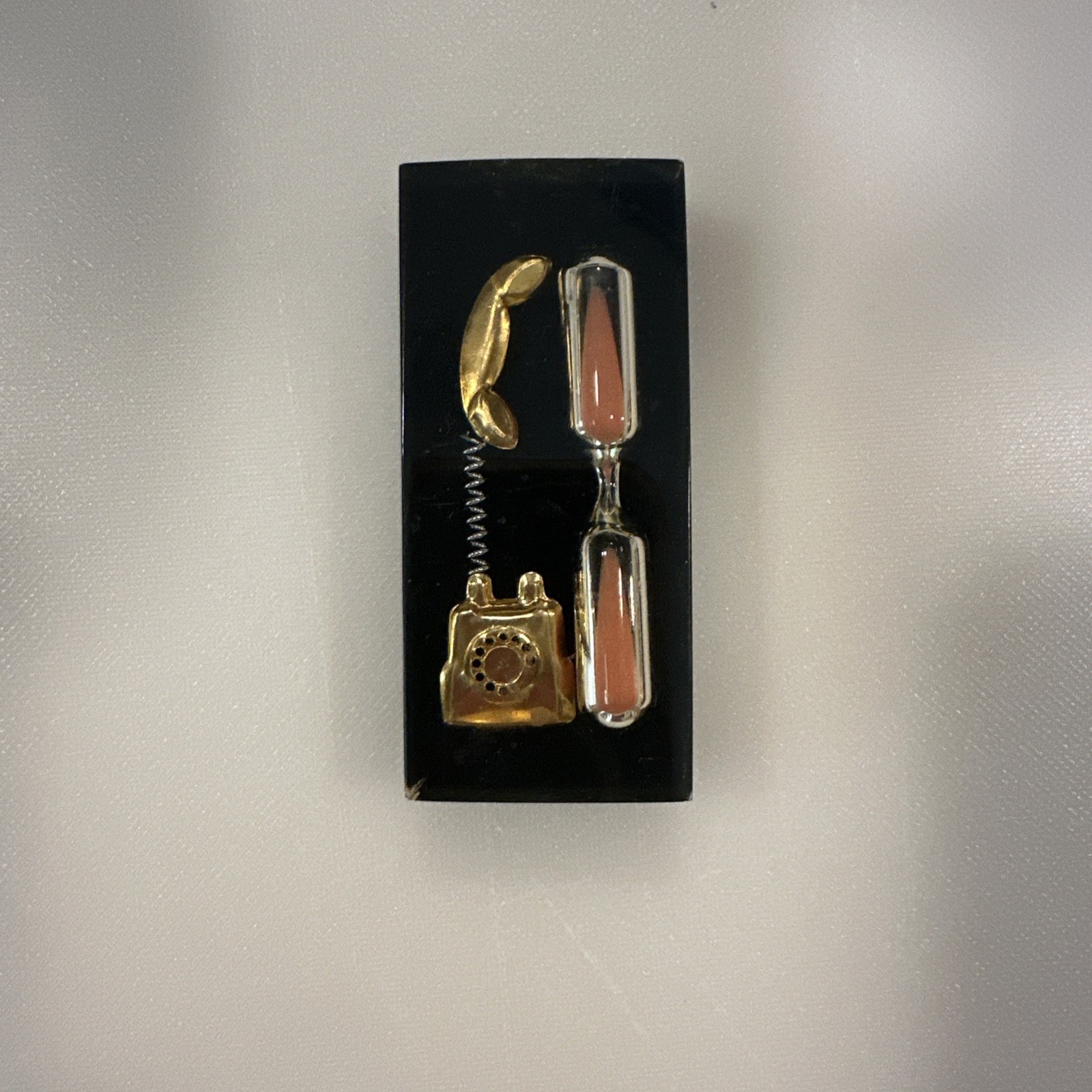 Vintage Antique Hour Glass With Phone Design 