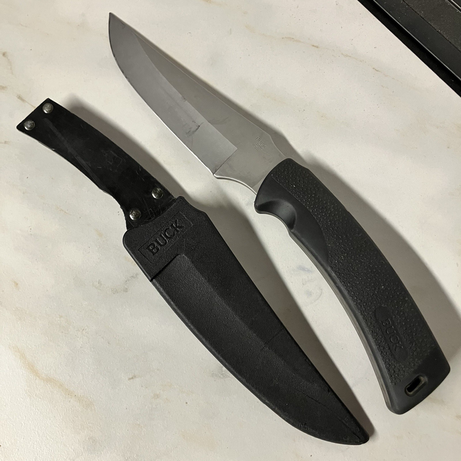 Possibly a Buck 470C USA Fixed Blade Knife Black Handle With Sheath