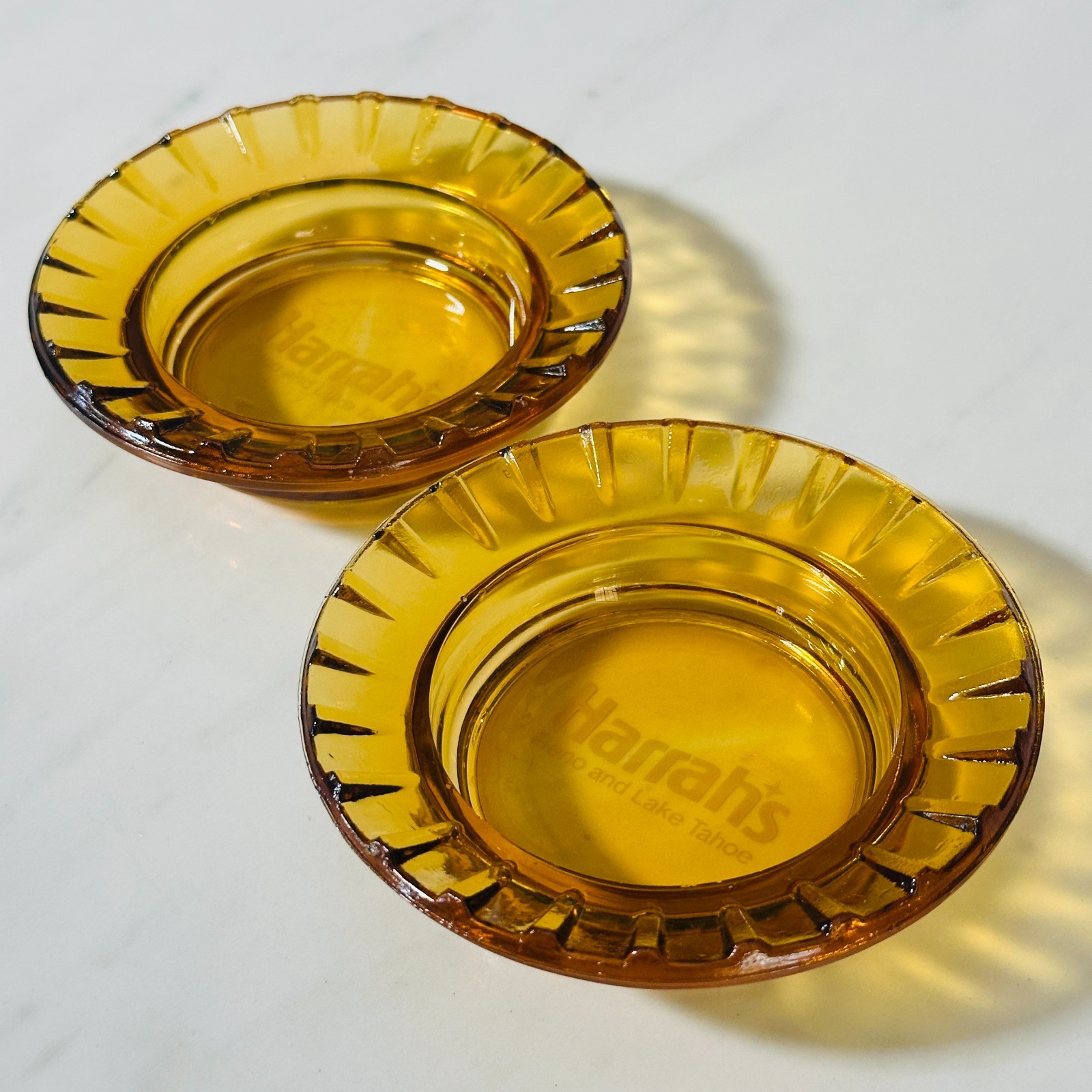 Vintage Harrah\'s Reno and Lake Tahoe Fluted Rim Amber Glass Ashtray - Lot of 2