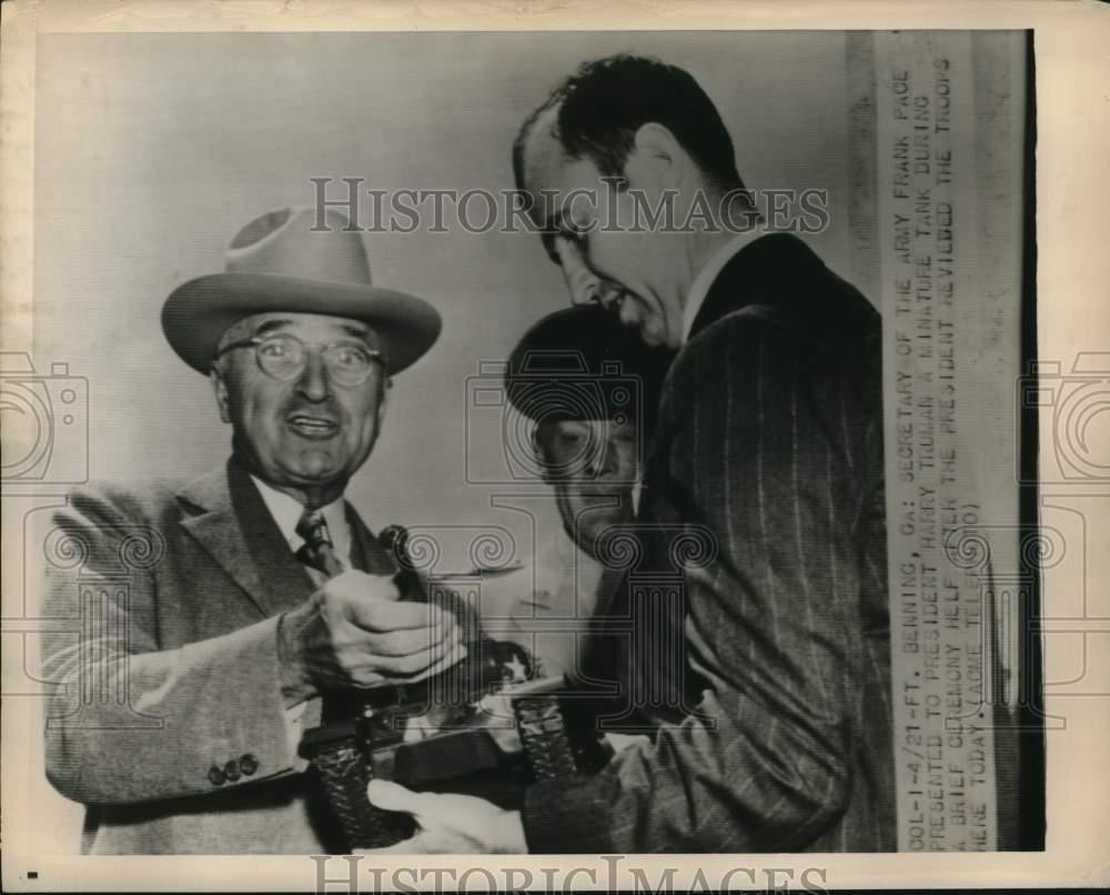 1950 Press Photo Frank Pace presents miniature tank to President Truman