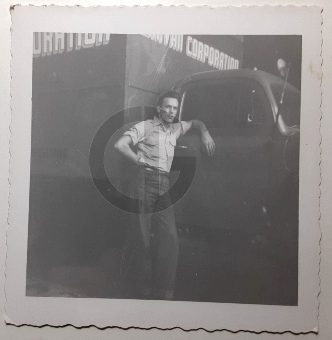 Man Posing @ Box Truck, Movers? Caravan Corporation?: 1950's Snapshot Photo