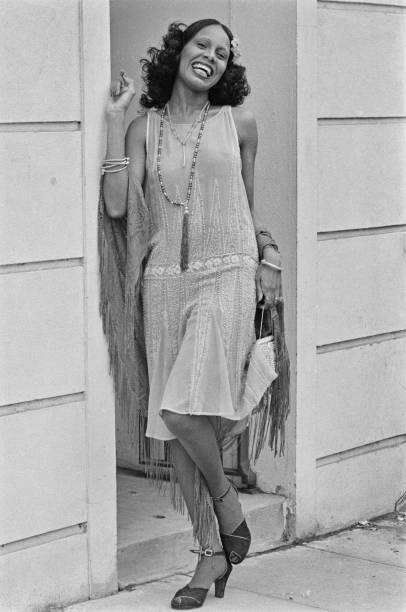 Fashion model Vanessa wearing a low-waisted dress and a shawl OLD PHOTO
