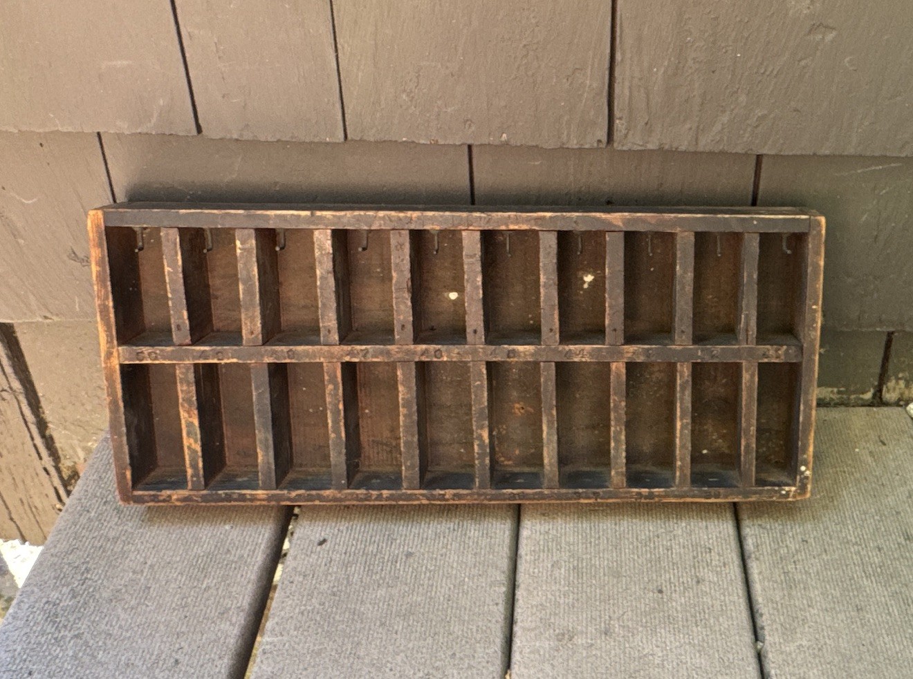 Vintage Compartment Box With Hooks and Random Numbers Embossed In The Wood. ￼