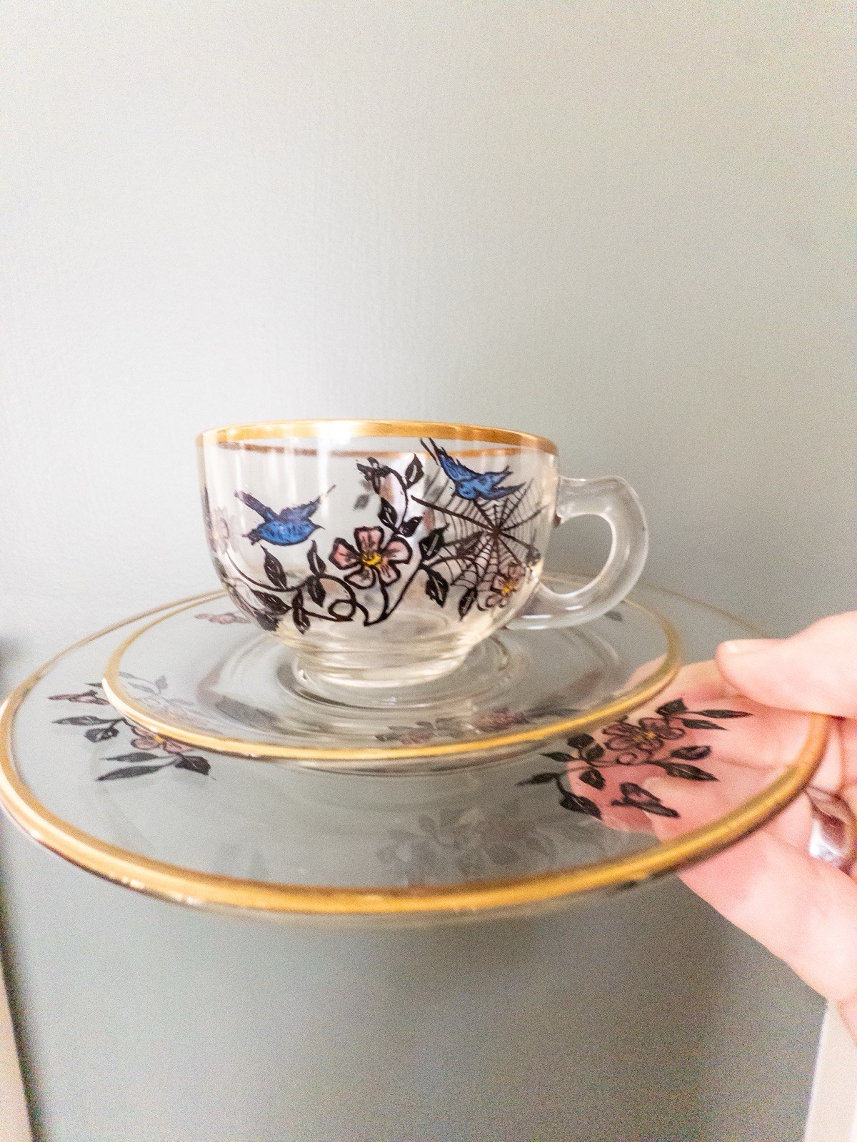 Vintage Hand-Painted Glass Teacup & Saucers – Blue Birds, Floral & Spiderweb Vintage Hand-Painted Glass Teacup & Saucers – Blue Birds, Floral & Spiderweb