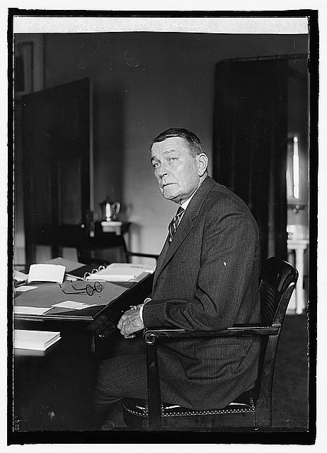 Photo:George R. James Seated at Desk Portrait 1923
