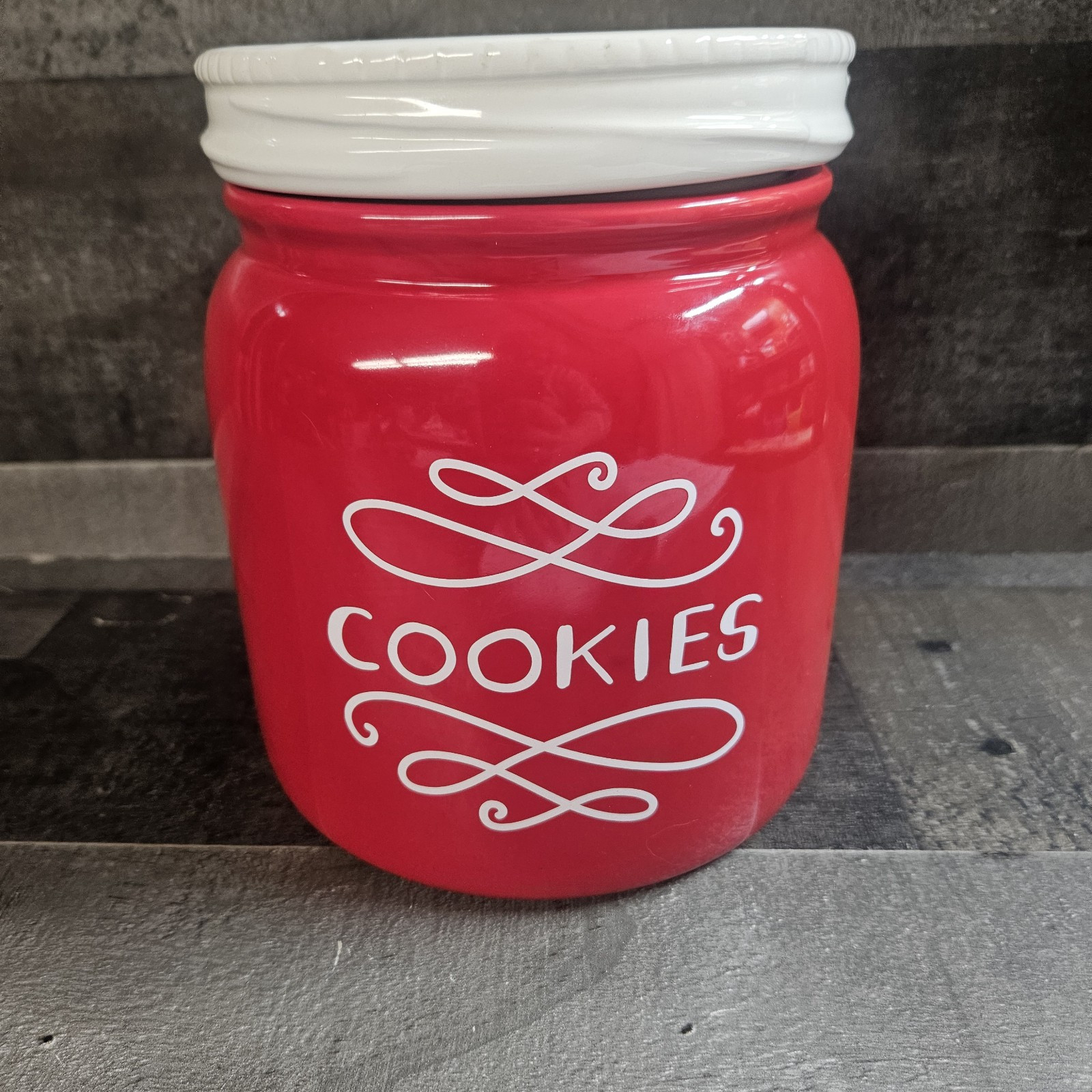 Red Cookie Jar w/white Lid. Target         7 1/2” H