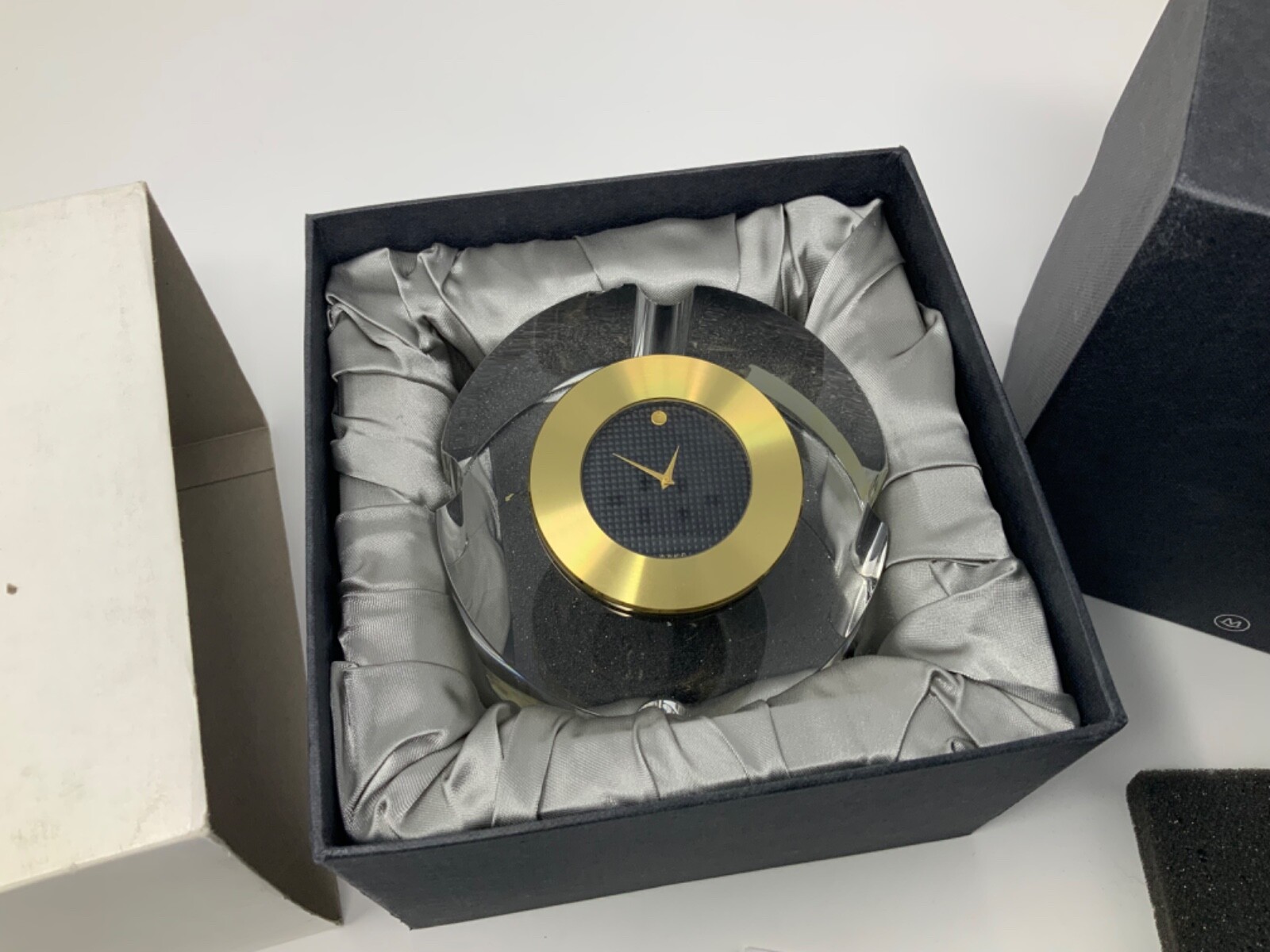 Movado Black Dial Round Crystal Clock TCL109M (chipped) READ