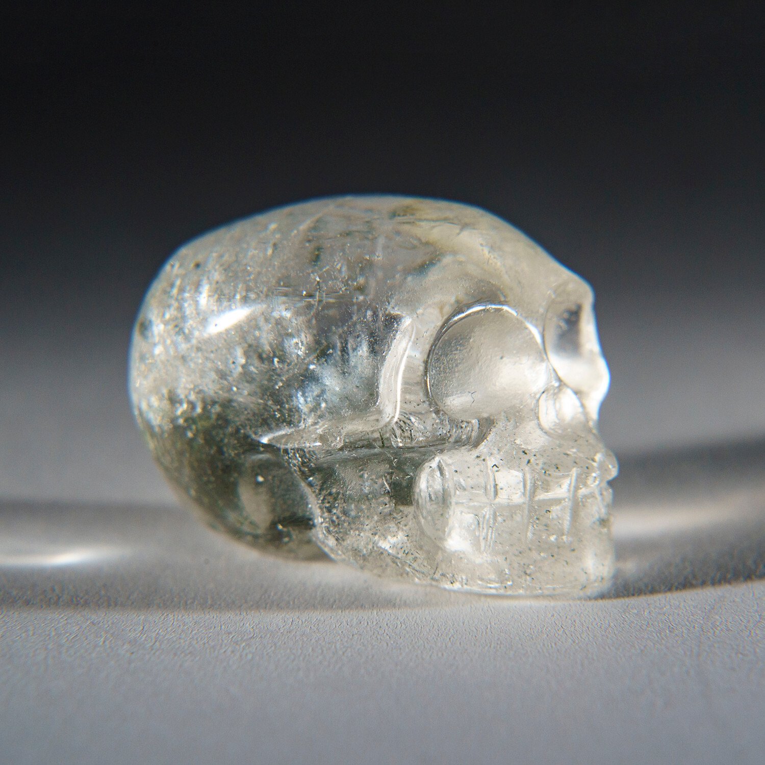 Genuine Polished Clear Quartz Skull Carving