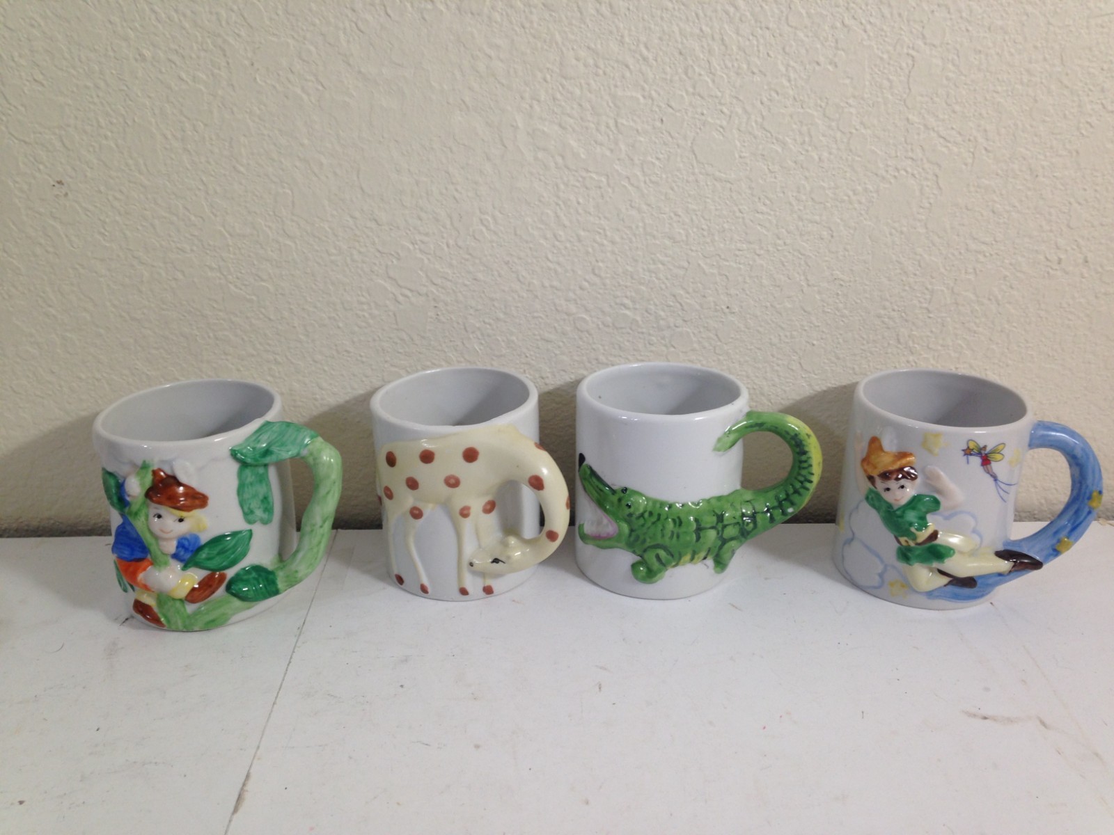 4 Vtg Jack and the Beanstalk, Peter Pan, Giraffe, Crocodile Child\'s Mug Cup JSNY 4 Vtg Jack and the Beanstalk, Peter Pan, Giraffe, Crocodile Child\'s Mug Cup JSNY