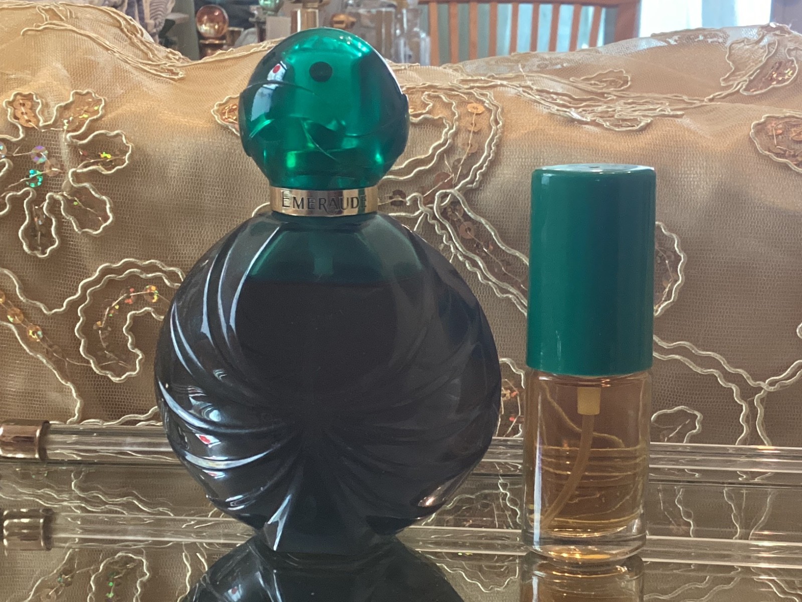Vintage Emeraude cologne perfume bottles x 2. Vintage Emeraude cologne perfume bottles x 2.