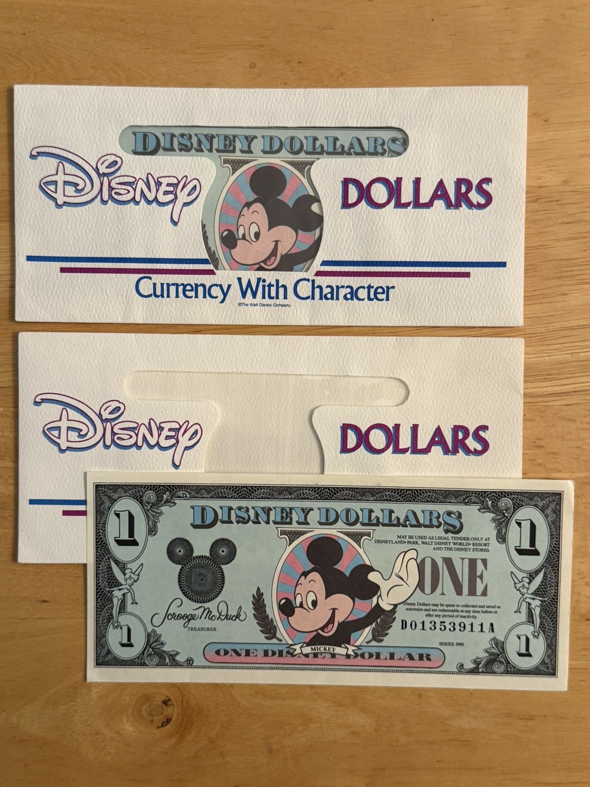 TWO Disney Dollars~1990~ $1 Mickey Mouse Series~w/Envelopes~ very nice