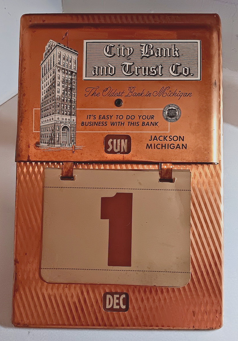1950'S CITY BANK AND TRUST CO JACKSON MICHIGAN VINTAGE METAL DAILY DATE CALENDAR
