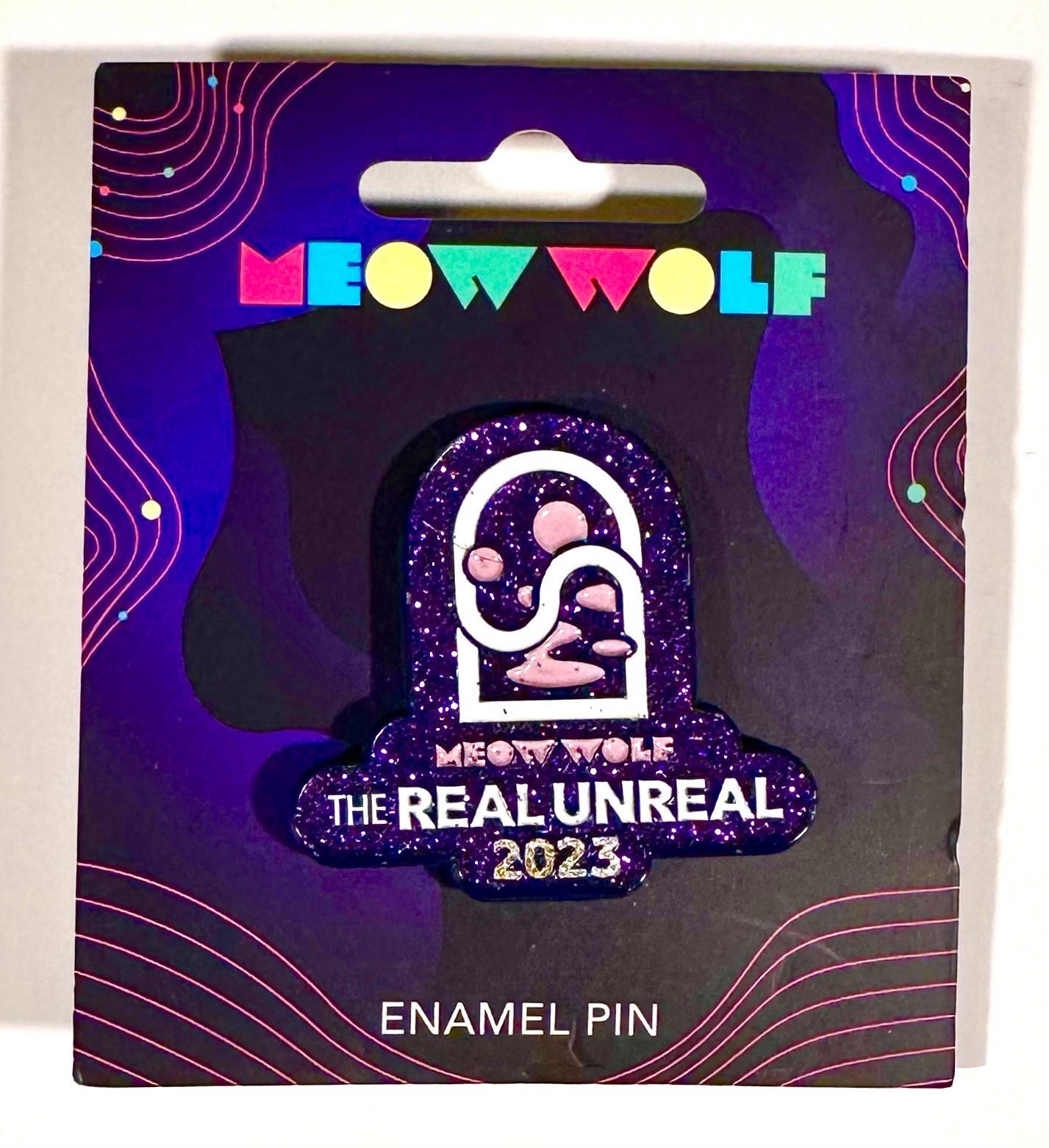 Meow Wolf 2023 The Real Unreal Exclusive Souvenir Collectible Purple Enamel Pin