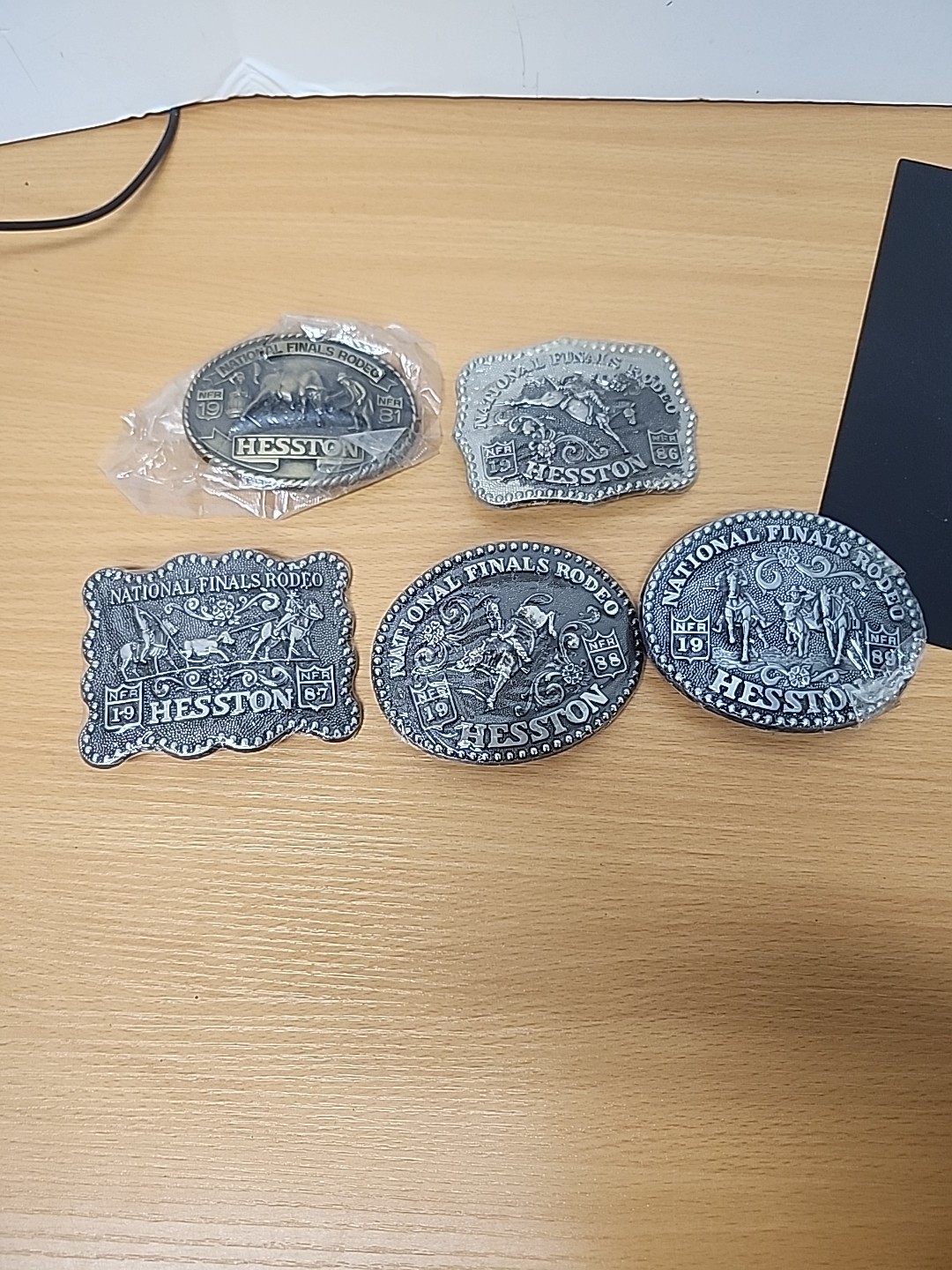 1981, 1986, 1987, 1988, 1989 New Hesston Rodeo Belt Buckles