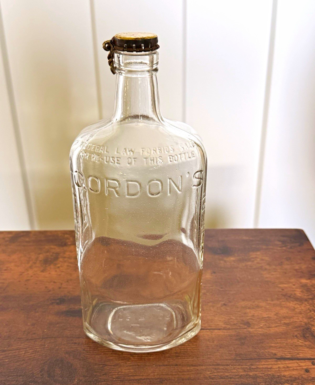 Vintage 1935-64 Gordon\'s Embossed Clear Glass Liquor Bottle with Metal Cap Vintage 1935-64 Gordon\'s Embossed Clear Glass Liquor Bottle with Metal Cap