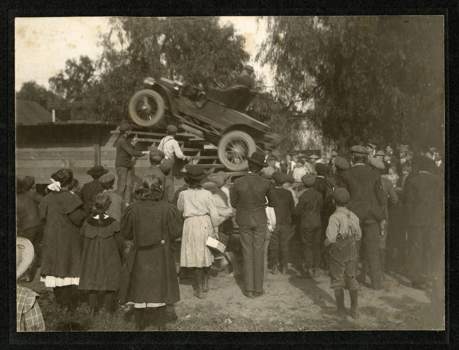 1900s Mounted Photo Stunt Driver Climbing Stairs at Reo Garage in Covina, CA