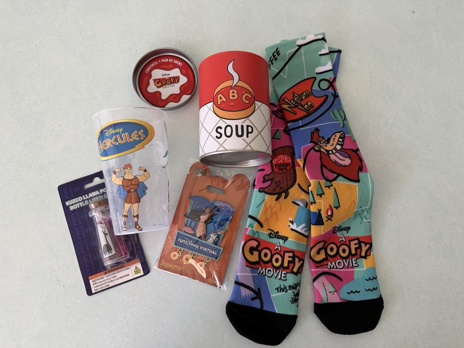 2026 runDisney Virtual Series 5K Swag Jumbo Pocahontas Pin Goofy Movie Socks Cup