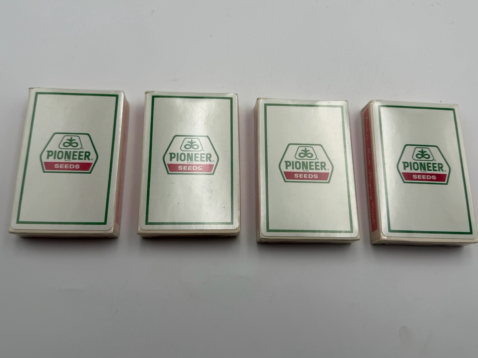 LOT OF 4 DECKS PIONEER SEEDS PLAYING CARDS NEW CORN FARM GAME IOWA FARMING GIFT