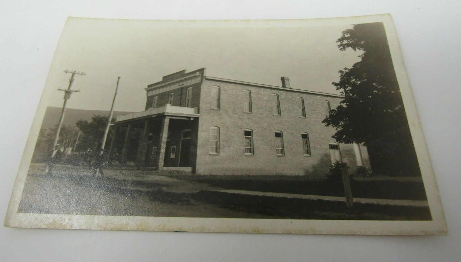 Unidentified Town Street Scene Brick Building RPPC Real Photo Postcard c1910s