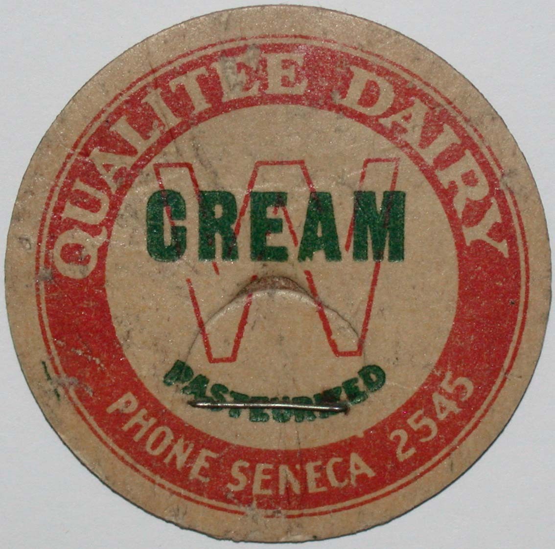 Vintage milk bottle cap QUALITEE DAIRY Cream Seneca 2545 Seattle Washington