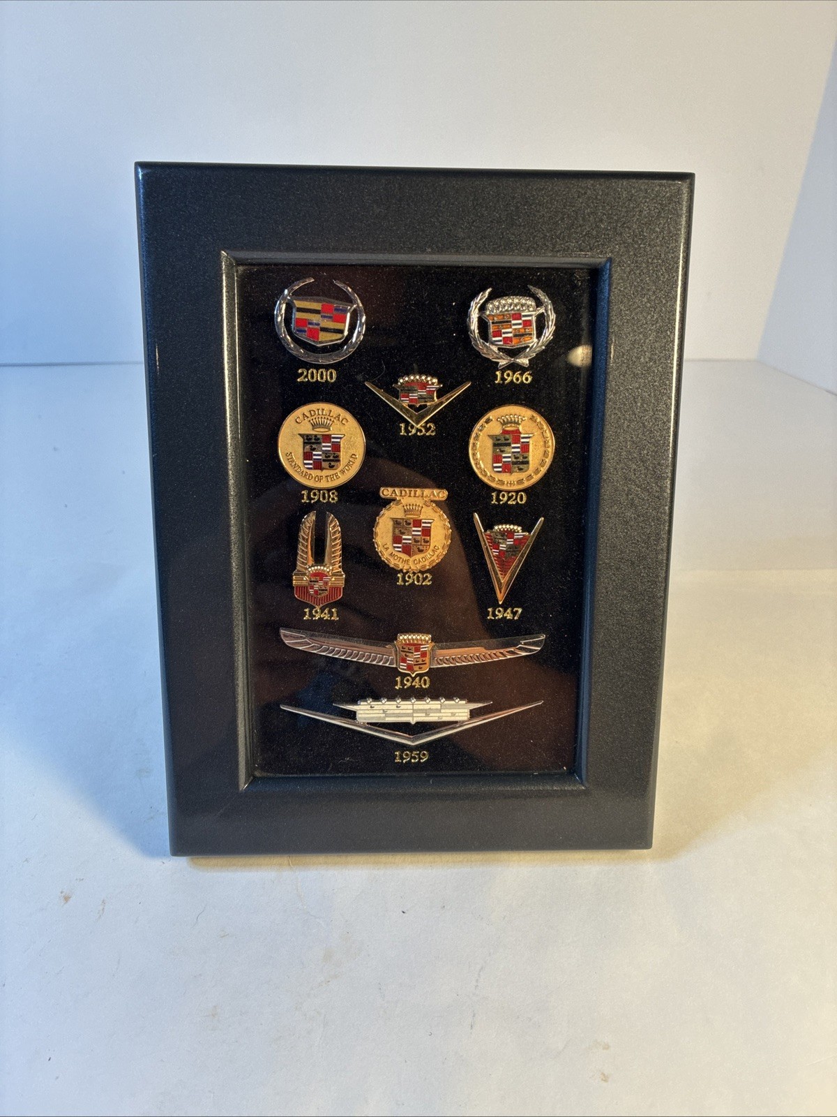 VTG Licensed GM Framed Collection Of 10 Cadillac Enamel Emblem Lapel Pins 100yrs VTG Licensed GM Framed Collection Of 10 Cadillac Enamel Emblem Lapel Pins 100yrs