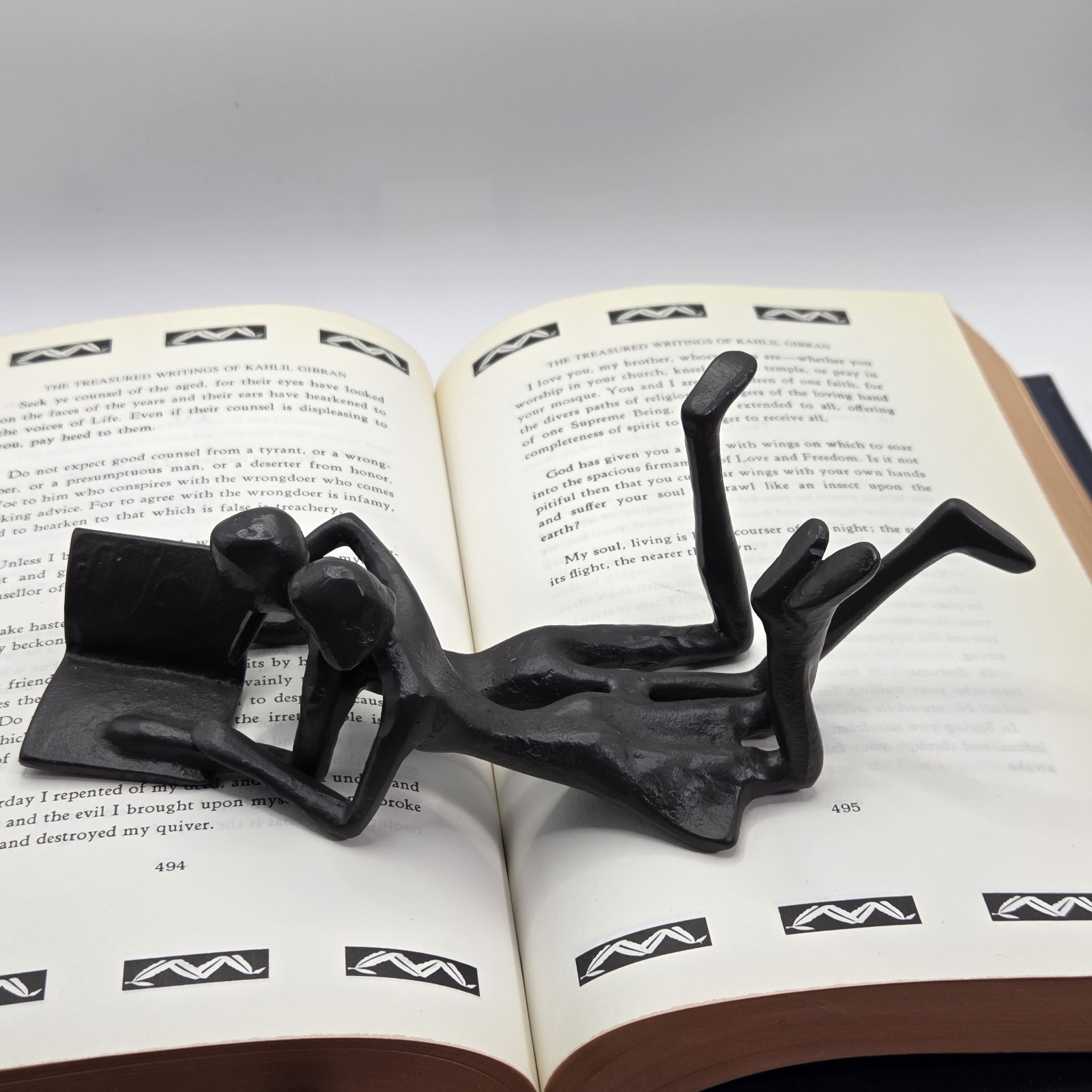 Danya B Brown Cast Iron Abstract Couple Reading Book Together Sculpture - Tablet Danya B Brown Cast Iron Abstract Couple Reading Book Together Sculpture - Tablet