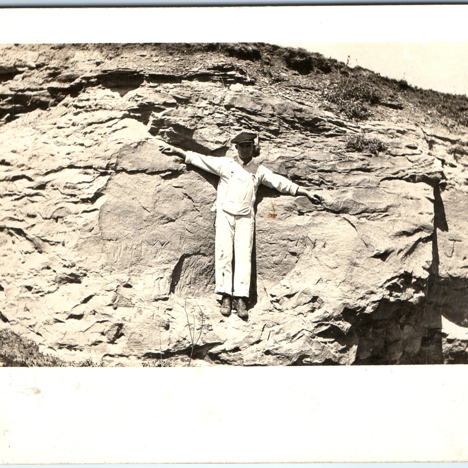 c1910s Man in White Overalls RPPC Postcard Carved Initials Rock Cliff PH AFV JM c1910s Man in White Overalls RPPC Postcard Carved Initials Rock Cliff PH AFV JM
