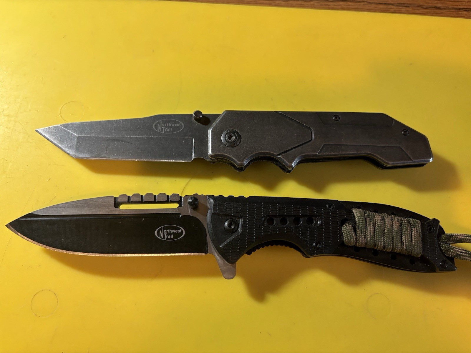 2-NORTHWEST TRAIL THUMB ASSIST LOCK BLADE KNIVES 3.5”BLADES USED GOOD COND. L-NT