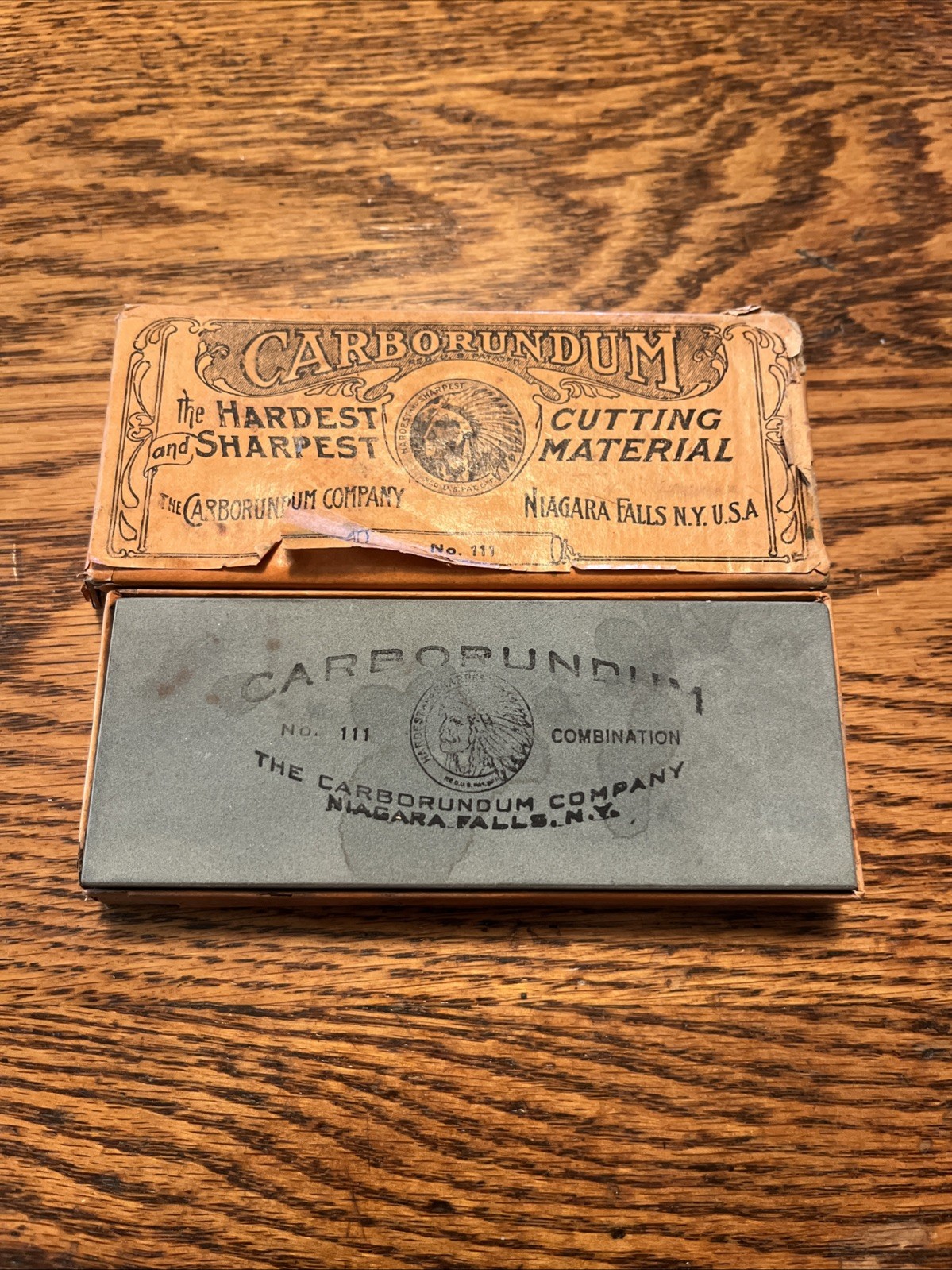 This is a vintage Carborundum sharpening stone, a Carborundum No. 111