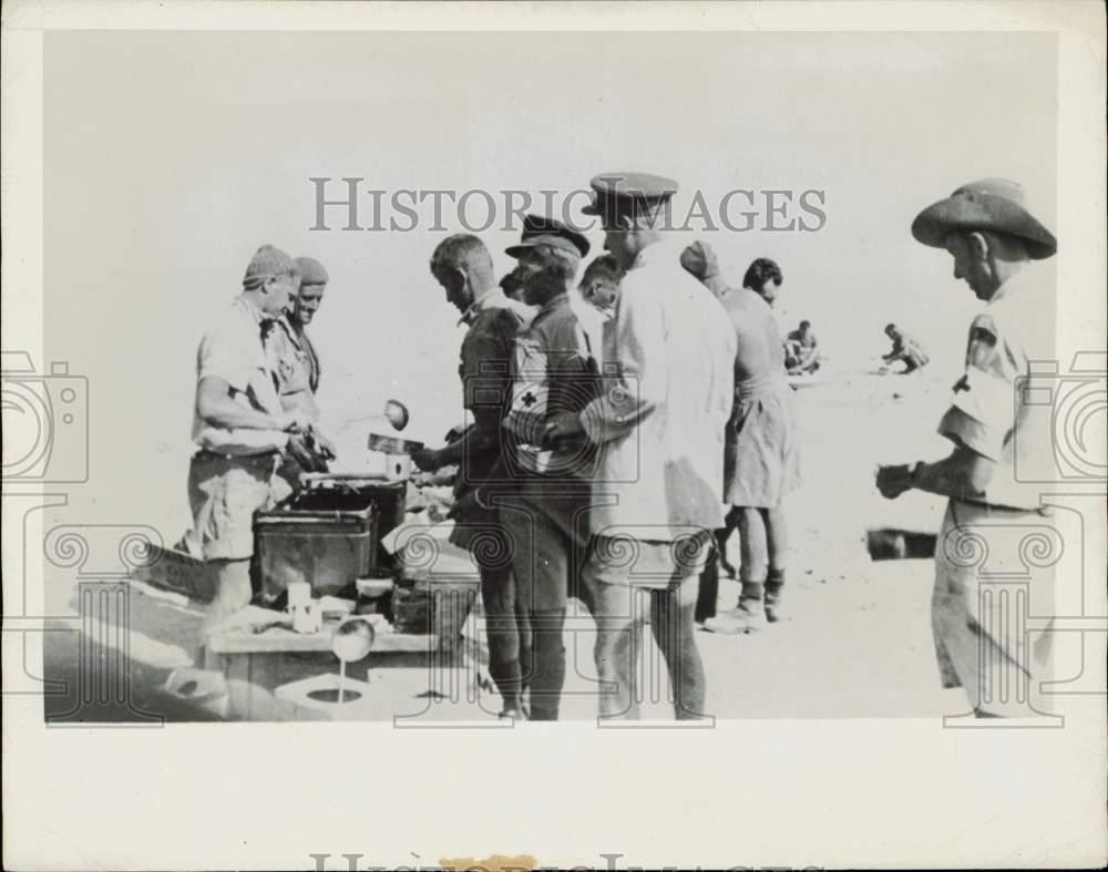 1942 Press Photo American Field Service men take break for lunch, Africa, WWII 1942 Press Photo American Field Service men take break for lunch, Africa, WWII