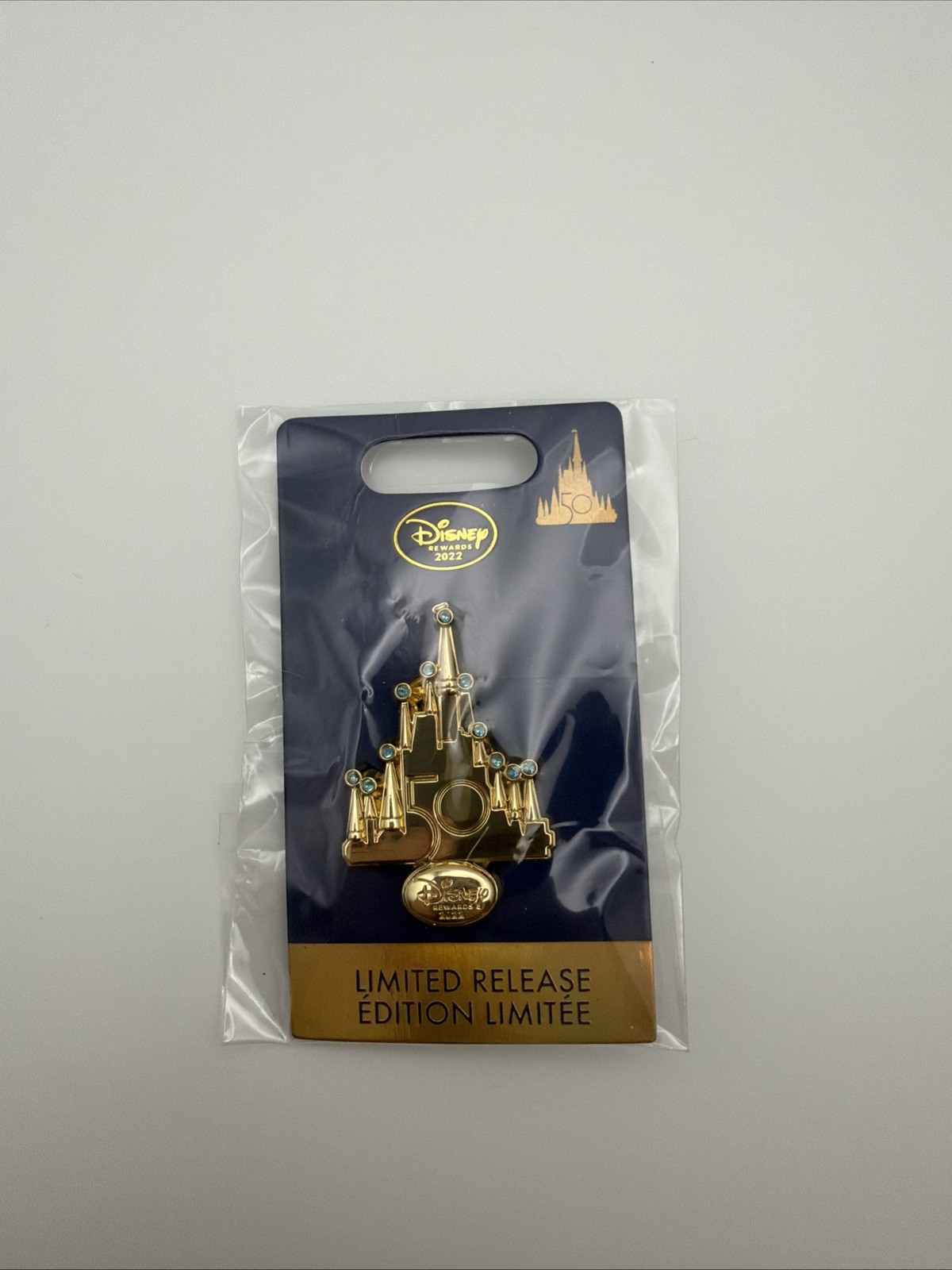 Disney Parks 2022 50th Anniversary LR Gold Castle Pin with Blue Stone Accents