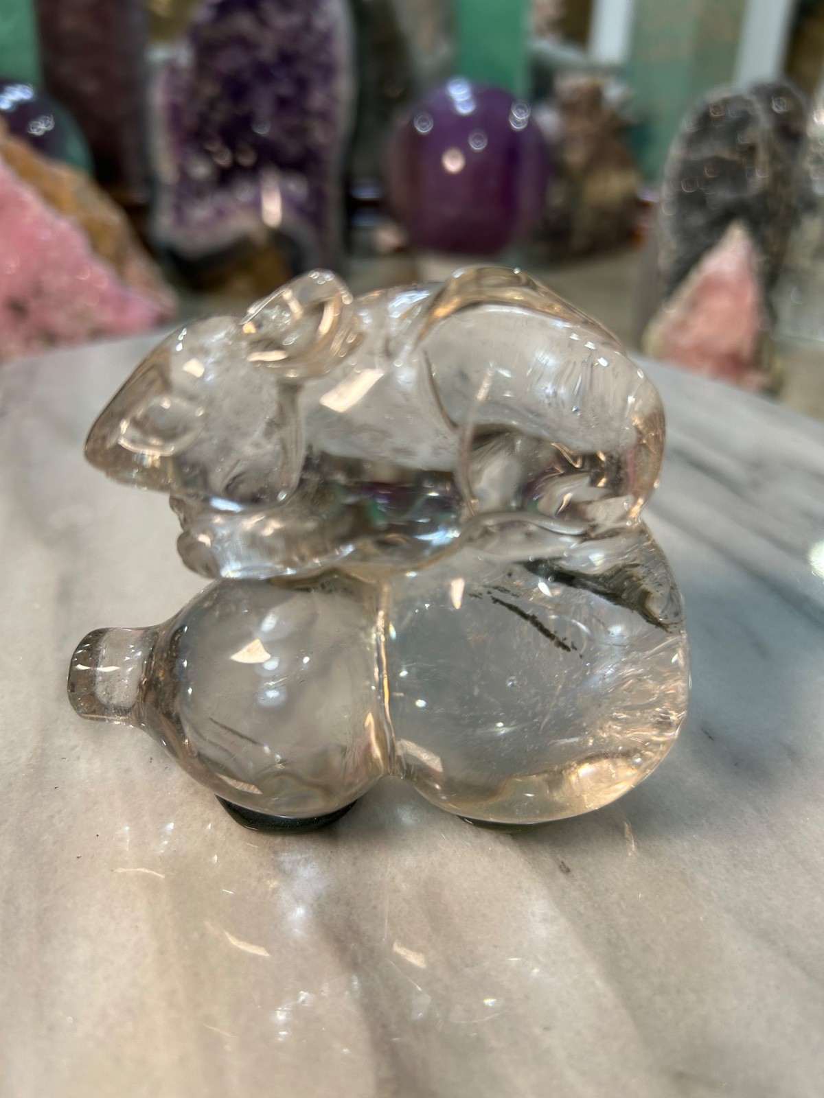 Garden quartz mouse on a gourd carving very clear