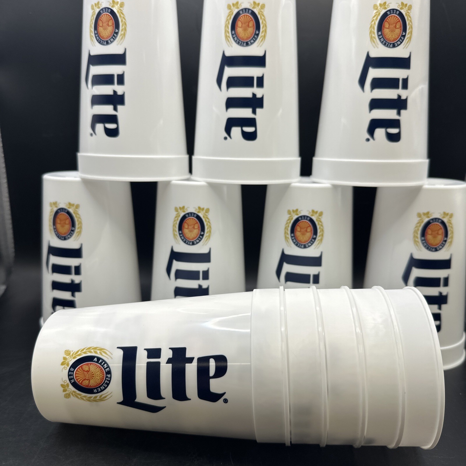 Lot of 12 Miller Lite 20 oz. Plastic Cups 2017 basketball promotion. Lot of 12 Miller Lite 20 oz. Plastic Cups 2017 basketball promotion.