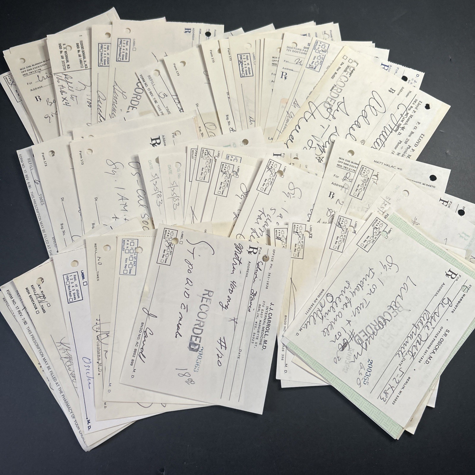 50 vintage handwritten pharmacy prescriptions.